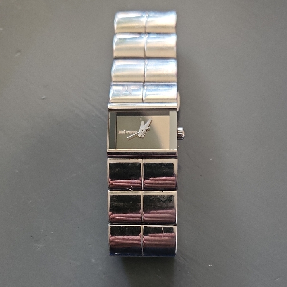 Nixon Silver and Black Wearable Watch